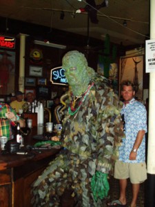 person in a swamp thing costume