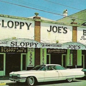 Car outside sloppy joes, earily 1960's