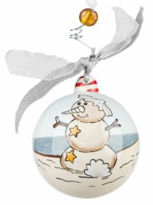 Glass coastal christmas ornament featuring a beach snowman
